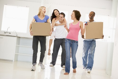 Professional movers loading boxes for a home move in Bickley
