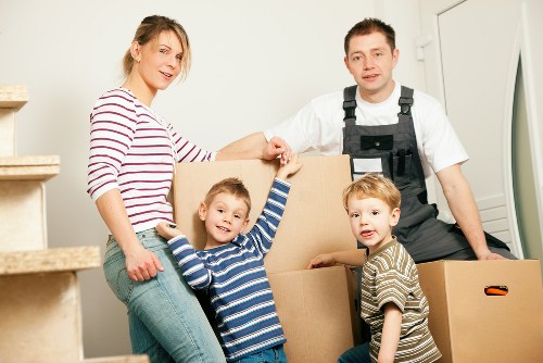Office furniture and equipment being prepared for a commercial move