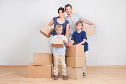 Packed boxes and furniture ready for a house relocation