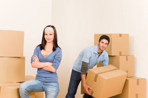 Man With A Van Bickley team handling moving tasks safely with protective equipment