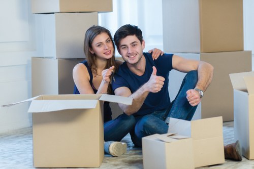 Office furniture and equipment being prepared for relocation
