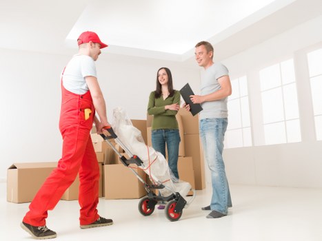 Local moving team handling furniture near Bickley