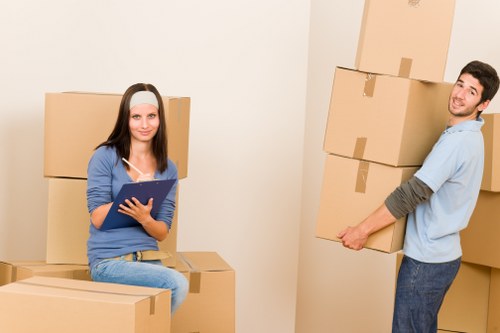 Packed office boxes and equipment ready for a commercial move